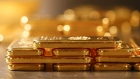 One kilogram fine gold bars sit stacked in the precious metals vault at Pro Aurum KG in Munich, Germany, on Wednesday, July 10, 2019. Gold rose for a third day after the Federal Reserve indicated that it’s preparing to cut interest rates for the first time in a decade as the global economy slows. 