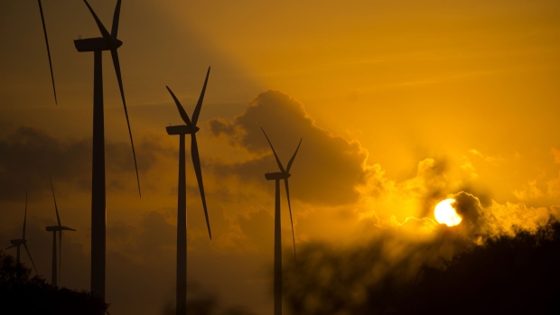 Wind turbines stand in Sarita, Texas. 