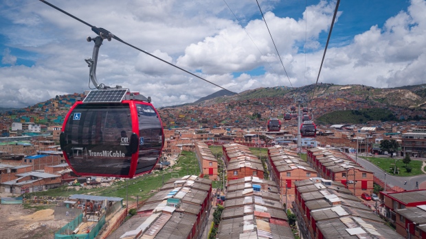Gondolas travel on the new TransMiCable cable car system over the Ciudad Bolivar neighborhood in Bogota, Colombia, on Thursday, May 30, 2019. The $100 million TransMiCable project has given mobility to the residents of marginalized neighborhoods in Bogota since December 2018, this as Colombia's consumer prices have seen a 3.27% increase year over year. 
