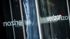 Signage is displayed on the doors of a Verizon Communications Inc. store in Chicago, Illinois, U.S., on Thursday, Jan. 24, 2019. Verizon is scheduled to release earnings figures on January 29. 