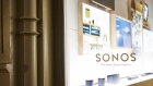 Signage is displayed on the window of a Sonos store in New York 