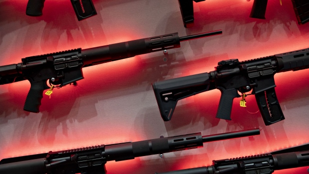 Rifles are displayed at the Franklin Armory Inc. booth during the National Rifle Association (NRA) annual meeting of members in Indianapolis, Indiana, U.S., on Saturday, April 27, 2019. Retired U.S. Marine Corps Lieutenant Colonel Oliver North has announced that he will not serve a second term as the president of the NRA amid inner turmoil in the gun-rights group. 