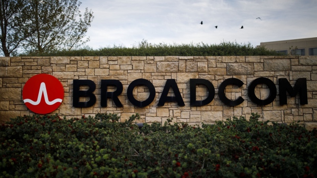Birds fly above signage displayed outside of Broadcom Ltd. headquarters in Irvine, California, U.S., on Monday, Nov. 6, 2017. Broadcom Ltd. and its advisers are gearing up for a proxy battle, making an appeal directly to shareholders, should Qualcomm Inc. reject its $105 billion takeover offer, according to a person with knowledge of the matter. 