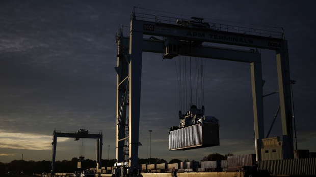 Shipping containers are loaded onto a CSX Intermodal train at the Port of Virginia APM Terminal in Portsmouth, Virginia. 