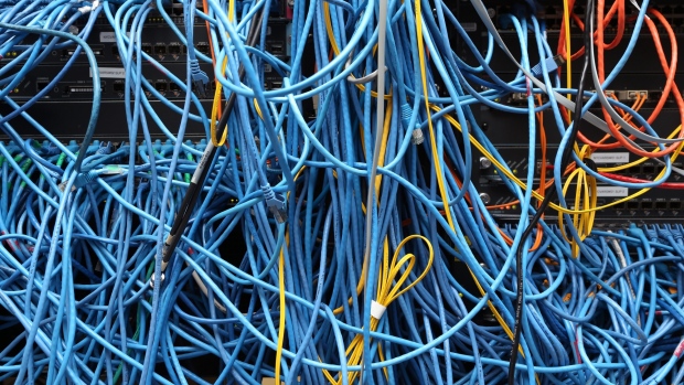 NEW YORK, NY - NOVEMBER 10: Network cables are plugged in a server room on November 10, 2014 in New York City. U.S. President Barack Obama called on the Federal Communications Commission to implement a strict policy of net neutrality and to oppose content providers in restricting bandwith to customers. (Photo by Michael Bocchieri/Getty Images)