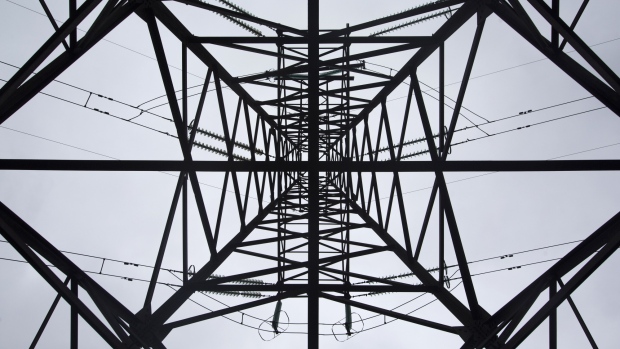 Electrical power lines sit on a pylon leading from the Trypilska thermal power station near Kiev, Ukraine, on Tuesday, Feb. 9, 2016. Trypilska needs millions of dollars to replace the original turbines, boilers and pipes and is one of hundreds of state-held properties whose sale could generate $1 billion this year alone and help finance the modernization of Ukraine's economy. 