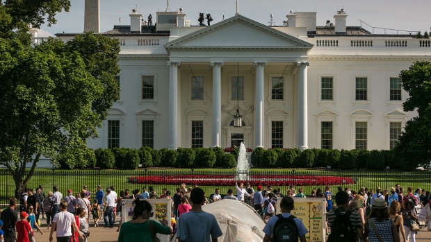 WASHINGTON, DC - JUNE 4: People gather in along The White House mall on June 4, 2017 in Washington, D.C. The nation's capital, the sixth largest metropolitan area in the country, draws millions of visitors each year to its historical sites, including thousands of school kids during the month of June. (Photo by George Rose/Getty Images) 