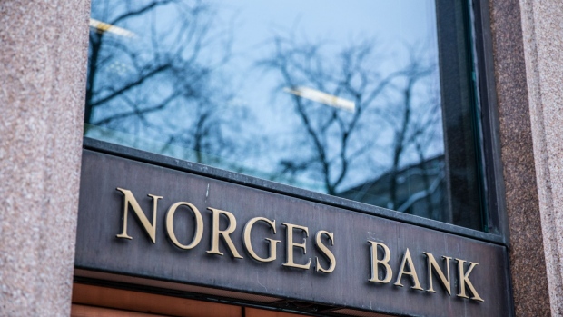A sign sits on the window of the Norges Bank building in Oslo, Norway, on Tuesday, Feb. 5, 2019. Norway will release its latest GDP figures on Friday. 