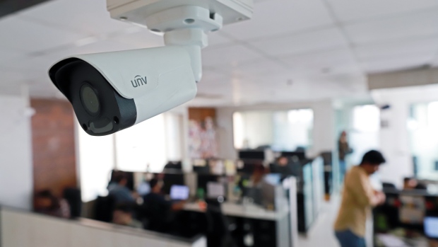 A surveillance camera with facial recognition technology at Staqu headquarters. 