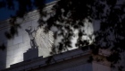 An eagle sculpture stands on the facade of the Marriner S. Eccles Federal Reserve building in Washington, D.C., U.S. 