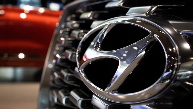 The Hyundai Motor Co. badge is displayed on the front grille of a Palisade sport utility vehicle (SUV) at the company's Motorstudio showroom in Goyang, South Korea, on Friday, July 19, 2019. Hyundai is scheduled to release second-quarter earnings result on July 22. 