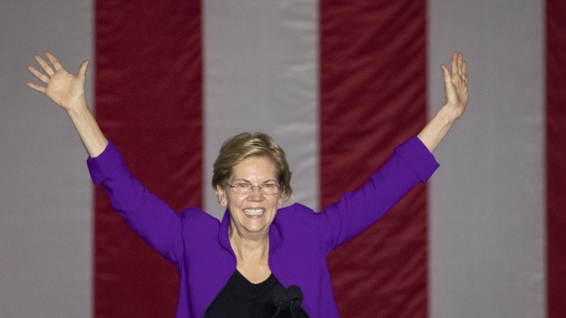 NEW YORK, NY - SEPTEMBER 16: 2020 Democratic presidential candidate Sen. Elizabeth Warren (D-MA) waves to the crowd at the end of a rally in Washington Square Park on September 16, 2019 in New York City. Warren unveiled a sweeping anti-corruption plan earlier on Monday. (Photo by Drew Angerer/Getty Images)