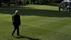 Trump walks on the South Lawn of the White House before boarding Marine One in Washington, D.C. 