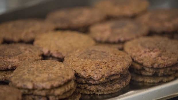 Cooked burger patties, featuring Beyond Meat Inc.'s vegetable-based burger recipe blend, wait to be assembled during the launch of the meat-free Neat Burger fast-food joint in London, U.K., on Monday, Sept. 2, 2019. Fast-food chains have been quick this year to offer plant-based meat and dairy substitutes in a race to win over consumers looking to cut down on animal protein, out of environmental or health concerns. 
