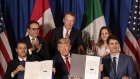 The presidents of Mexico, the U.S. and Canada sign USMCA in November 2018