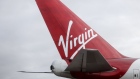The tail fin of passenger aircraft, operated by Virgin Atlantic Airways Ltd., sits at London Gatwick Airport in Crawley, U.K., on Tuesday, Jan. 10, 2017. Discount airlines are piling on passengers using bargain-basement pricing even as a sluggish economy and the threat of terror attacks clips demand. 