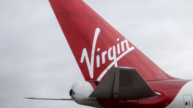 The tail fin of passenger aircraft, operated by Virgin Atlantic Airways Ltd., sits at London Gatwick Airport in Crawley, U.K., on Tuesday, Jan. 10, 2017. Discount airlines are piling on passengers using bargain-basement pricing even as a sluggish economy and the threat of terror attacks clips demand. 