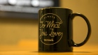 A WeWork Cos. branded cup sits on a desk at the company's 32nd Milestone co-working space in Gurugram, India, on Monday, Feb. 18, 2019. The New York-based co-working giant WeWork Cos, which operates shared office spaces around the world, has attracted huge piles of investor money, which it uses to snap up office space in the largest cities on earth. 