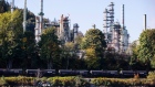 A Canadian Pacific Rail Ltd. (CPR) locomotive pulls oil tankers past the Burnaby Refinery, operated by Parkland Fuel Corp., in Burnaby, British Columbia, Canada, on Wednesday, Sept. 19, 2018. U.S. Trade Representative Robert Lighthizer and Canadian Foreign Minister Chrystia Freeland met Thursday in Washington to negotiate Nafta talks, but no agreement was reached. 