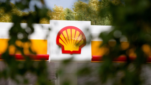 A scallop shaped Shell logo sits on display above a newly opened gas station, operated by Royal Dutch Shell Plc, in Kemerovo, Russia, on Friday, Sept. 14, 2018. Royal Dutch Shell plans to double the number of its petrol stations in Russia to 450, says Sergey Starodubtsev, the director-general of Shell Neft, the company's Russian subsidiary. 