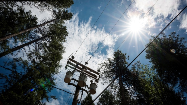 Pacific Gas & Electric Co. (PG&E) transformers and power lines stand in Nevada City, California, U.S., on Wednesday, June 12, 2019. Record temperatures in California this week prompted calls to conserve energy and triggered PG&E's wildfire-prevention plan. 