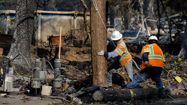 PG&E workers repair power lines following a fire in Santa Rosa, California on Oct. 13, 2017.