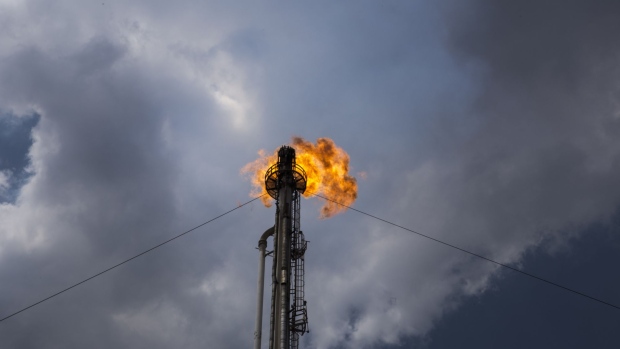 A gas flare stands at the Petroleos Mexicanos (PEMEX) Miguel Hidalgo Refinery in Tula, Hidalgo, Mexico, on Tuesday, April 18, 2017. The $2.1 billion project to develop and operate a coker unit at the Pemex's Tula refinery will turn lower-value fuel into products like gasoline and diesel. 