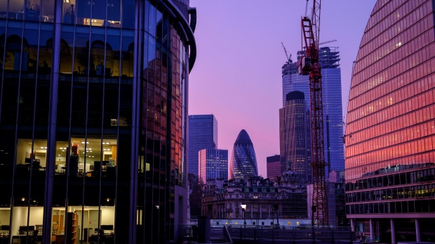 Skyscrapers including; 30 St Mary Axe, also known as "the Gherkin" and 2 2 Bishopsgate office tower, stand on the skyline in the City of London, U.K., on Saturday, April 13, 2019. Job vacancies in London’s finance industry have halved in two years as uncertainty over Brexit knocks business confidence, a survey by recruiter Morgan McKinley has found. 