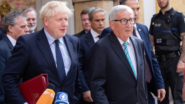 British Prime Minister Boris Johnson and European Commission President Jean-Claude Juncker emerge after having a working lunch together in a restaurant in the city center on September 16, 2019 in Luxembourg, Luxembourg.
