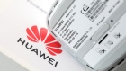 Information sits on the base of a 5G CPE (customer-premises equipment) Pro router, manufactured by Huawei Technologies Co., following a news conference announcing the rollout of BT Group Plc's EE 5G network in London, U.K., on Wednesday, May 22, 2019. 