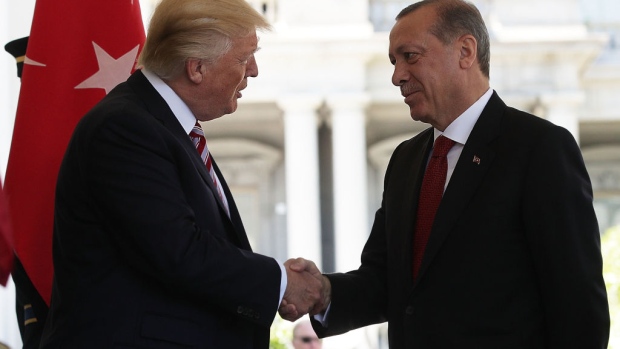 WASHINGTON, DC - MAY 16: U.S. President Donald Trump (L) welcomes President Recep Tayyip Erdogan (R) of Turkey outside the West Wing of the White House May 16, 2017 in Washington, DC. President Trump hosted President ErdoganÊwith an Oval Office meeting and a working luncheon. Both leaders are expected to give a joint statement. (Photo by Alex Wong/Getty Images)