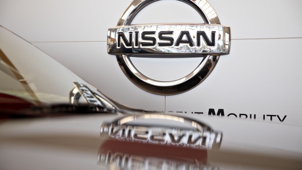 Nissan Motor Co. signage is displayed in the showroom of a car dealership in Joliet, Illinois, U.S., on Wednesday, Oct. 2, 2019. Auto sales in the U.S. probably took a big step back in September, setting the stage for hefty incentive spending by carmakers struggling to clear old models from dealers' inventory. 