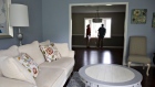 A real estate agent shows a prospective home buyer a house for sale in Peoria, Illinois. Photographer: Daniel Acker/Bloomberg