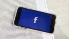 The Facebook Inc. logo is displayed on an Apple Inc. iPhone in this arranged photograph taken in Greenwich, Connecticut, U.S., on Monday, April 23, 2019. As Facebook Inc. prepares to report first-quarter results Wednesday, analysts are confident that the social-media company has moved past negative headlines that dogged the stock throughout the second half of 2018 and is positioned to monetize its massive user base in new ways. 