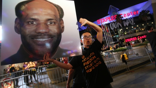 A pro-Hong Kong activist -shirts outside Scotiabank Arena on Toronto Raptors opening night, Oct. 22. Photographer: Cole Burston/Getty Images
