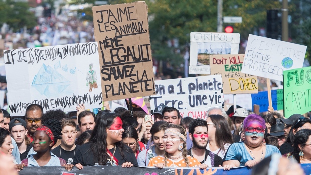 People march during a climate strike in Montreal, Sept. 27, 2019. The Canadian Press/Graham Hughes
