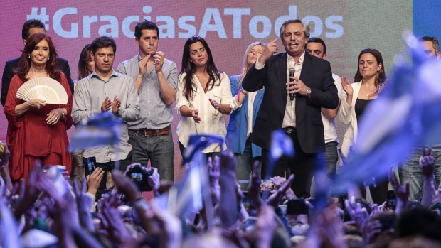 An image of Alberto Fernandez, presidential candidate for Frente de Todos Party, is displayed at the party's headquarters during an election night rally in the Chacarita neighborhood of Buenos Aires, Argentina, on Sunday, Oct. 27, 2019. Opposition candidate Alberto Fernandez swept Argentina's presidential election, ousting pro-market incumbent Mauricio Macri and tilting the nation back toward left-wing populism at a time of economic crisis. Photographer: Sarah Pabst/Bloomberg
