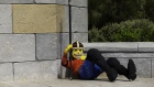 A reclining model guard, made out of Lego bricks, stands on display at the Legoland Dubai theme park