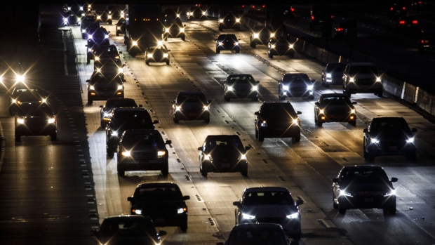 Vehicles drive in traffic down the 405 freeway at night in Inglewood, California, U.S., on Thursday, Sept. 19, 2019. The Trump administration moved to strip California of its authority to limit greenhouse gas emissions from vehicles, even as it warned the state it needs to do more to combat smog. 