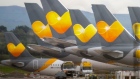Passenger aircraft operated by Thomas Cook Group Plc sit on the tarmac at Manchester Airport in Manchester, U.K., on Monday, Sept. 23, 2019. Thomas Cook collapsed under a pile of debt after talks with creditors failed, forcing the British government to charter planes to bring home more than 150,000 of the storied travel provider’s stranded customers. 