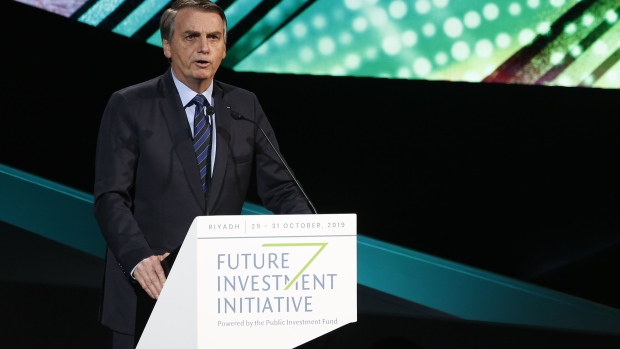 Jair Bolsonaro, Brazil's president, speaks on day two of the Future Investment Initiative (FII) forum at the Ritz Carlton hotel in Riyadh, Saudi Arabia, on Wednesday, Oct. 30, 2019. Crown Prince Mohammed bin Salman will determine the timing of oil giant Saudi Aramco’s long-anticipated share sale, according to the kingdom’s energy minister. 