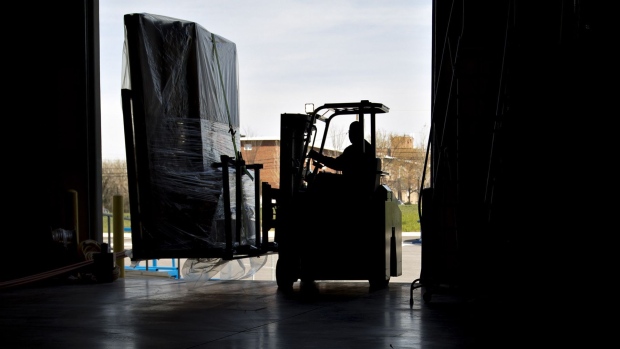 An employee moves an order of walls on a forklift in Baltimore, Maryland. 
