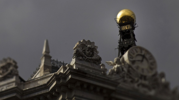 A gold finial stands above Spain's central bank, also known as Bank of Spain, in Madrid, Spain. 