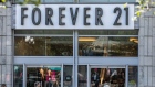 Pedestrians pass in front of a Forever 21 Inc. store in the Union Square neighborhood of New York, U.S., on Thursday, Aug. 29, 2019. Forever 21 Inc. is preparing for a potential bankruptcy filing as the fashion retailers cash dwindles and turnaround options fade, according to people with knowledge of the plans. 