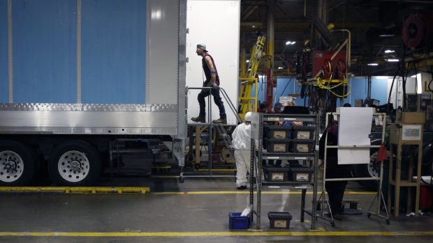 Workers assemble a semi-trailer at the Wabash National Corp. manufacturing facility in Lafayette, In