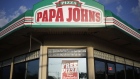 Signage is displayed outside a Papa John's International Inc. pizza restaurant in Louisville, Kentucky, U.S., on Friday, Aug. 3, 2018. Papa John's International Inc. is scheduled to release earnings on August 7.