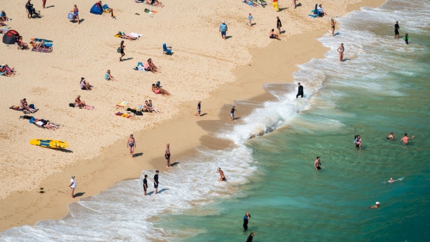PENZANCE, ENGLAND - JUNE 28: People enjoy the fine weather as they spend time on the beach at Porthcurno Beach near Penzance on June 28, 2018 in Cornwall, England. Parts of the UK are continuing to experience heatwave weather and record breaking temperatures. (Photo by Matt Cardy/Getty Images)
