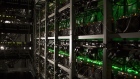 Cryptocurrency mining rigs operate in a cargo container at the Golden Fleece cryptocurrency mining company in Kutaisi, Georgia, on Monday, Jan. 22, 2018. Golden Fleece uses a cargo container with Chinese-built computers inside a dilapidated Soviet-era tractor factory to extract cryptocurrencies using low-cost electricity generated by water flowing from the nearby Caucasus Mountains. 