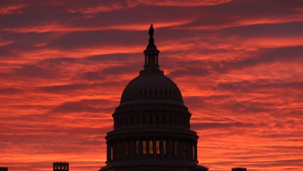 WASHINGTON, DC - NOVEMBER 07: The sky turns to a fiery color as the sun begins to rise behind the U.S. Capitol building, on November 7, 2019 in Washington, DC. Chairman of the House Intelligence Committee, Adam Schiff (D-CA) announced that public hearings will begin next week in the impeachment inquiry against U.S. President Donald Trump. (Photo by Mark Wilson/Getty Images) 