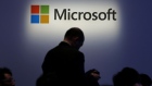 The Microsoft Corp. logo is displayed at a launch event for the company's Windows 8.1 operating system in Tokyo, Japan.